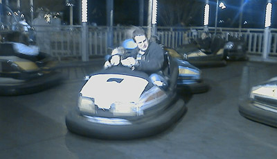 Me driving a bumber car. Will can just barely be seen, sitting to my right Me driving a bumber car. Will can just barely be seen, sitting to my right