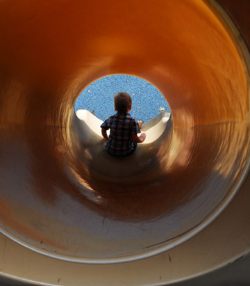Will, sliding down a slide Will, sliding down a slide